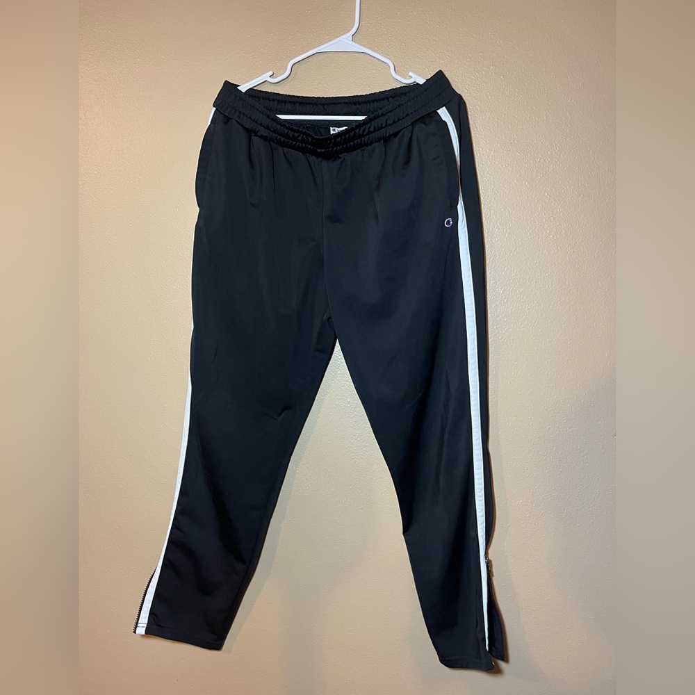 Black champion sweatpants with white stripe